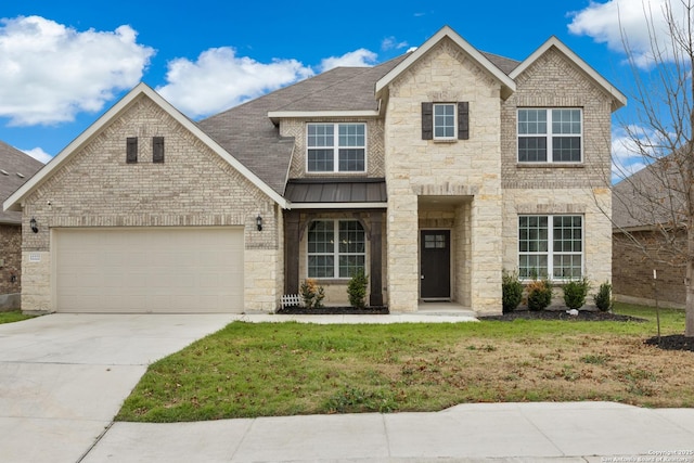 view of front facade with a garage and a front lawn