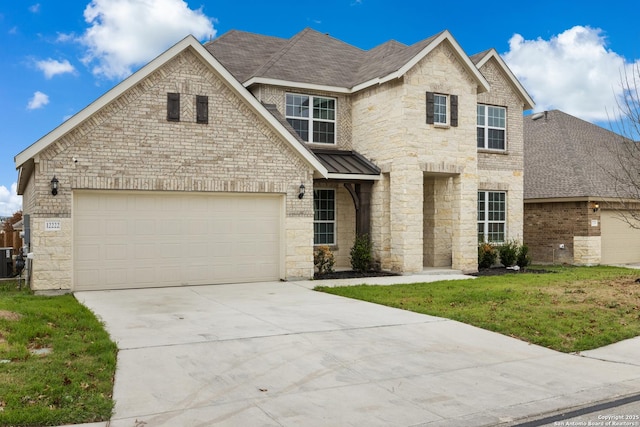 view of front of home with central AC unit and a front lawn