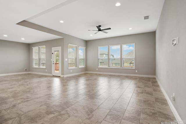 interior space with ceiling fan and a healthy amount of sunlight