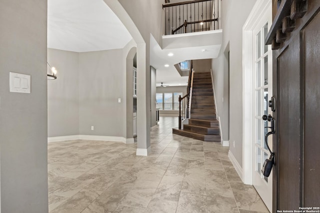 entryway with a high ceiling