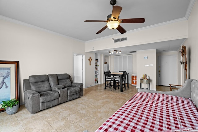 living room with ornamental molding, light tile patterned floors, and ceiling fan