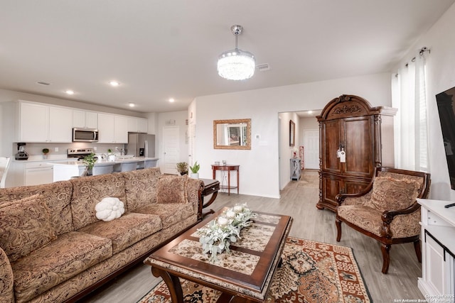 living room with light wood-type flooring