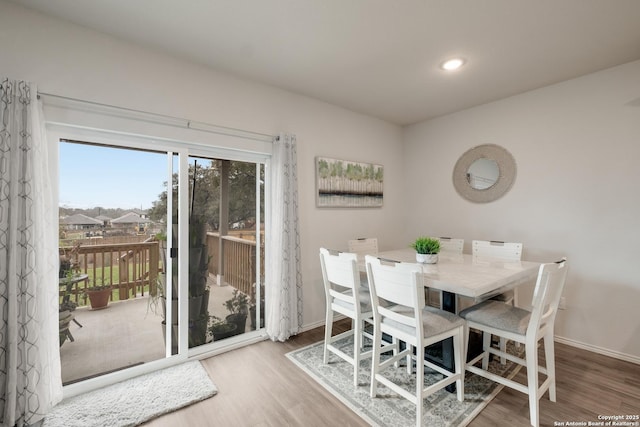 dining room featuring light hardwood / wood-style flooring