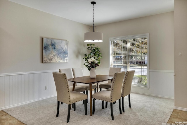 dining area with light carpet