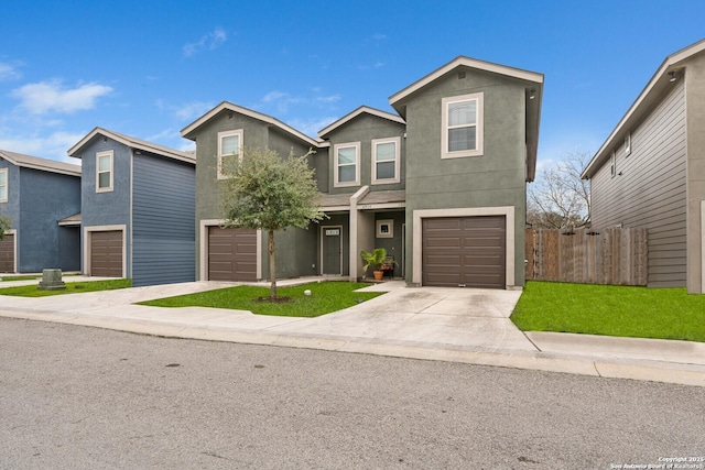 front facade with a garage and a front yard