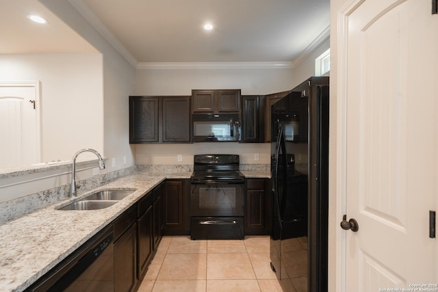 kitchen with sink, crown molding, light tile patterned floors, black appliances, and light stone countertops