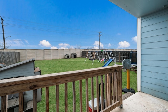 exterior space featuring a playground and a lawn