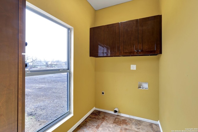 washroom with cabinets, plenty of natural light, hookup for an electric dryer, and washer hookup