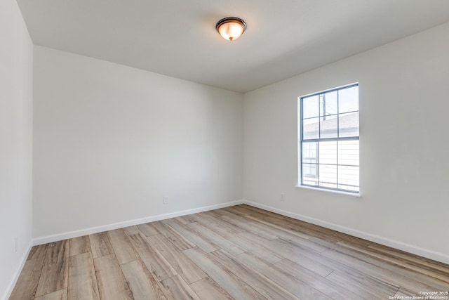 empty room with light wood-type flooring