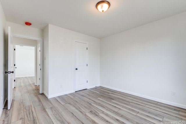 unfurnished bedroom with light hardwood / wood-style flooring