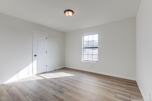 empty room featuring light hardwood / wood-style floors