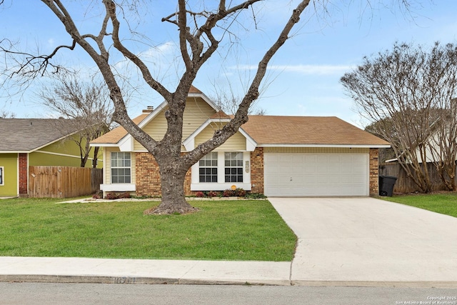 view of front of house with a garage and a front lawn