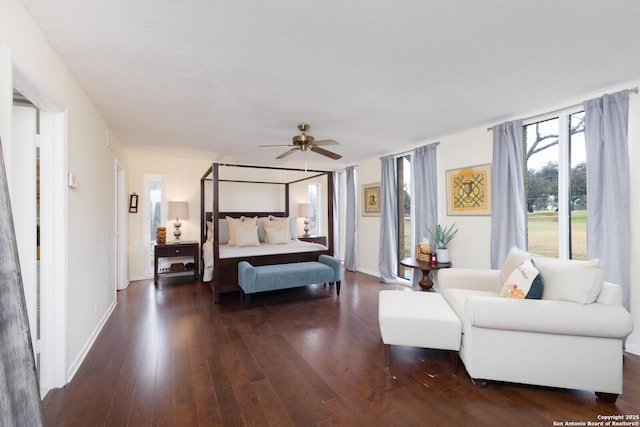 bedroom featuring dark hardwood / wood-style flooring and ceiling fan