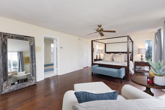 bedroom with ceiling fan and dark hardwood / wood-style flooring