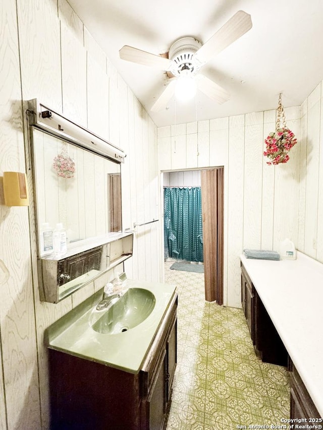 bathroom featuring vanity and ceiling fan