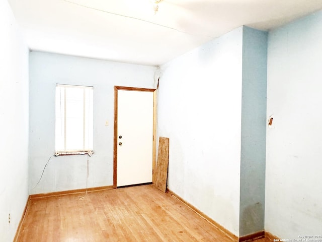 unfurnished room featuring light hardwood / wood-style flooring