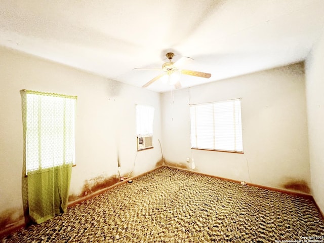 empty room featuring ceiling fan