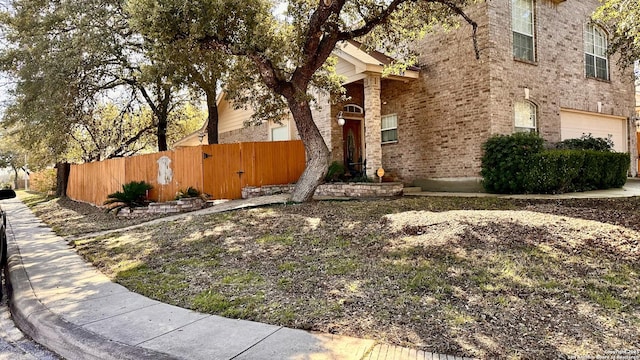 view of side of property featuring a garage