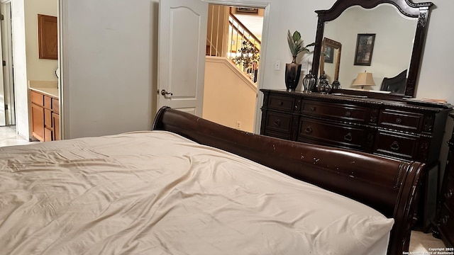 bedroom featuring ensuite bath