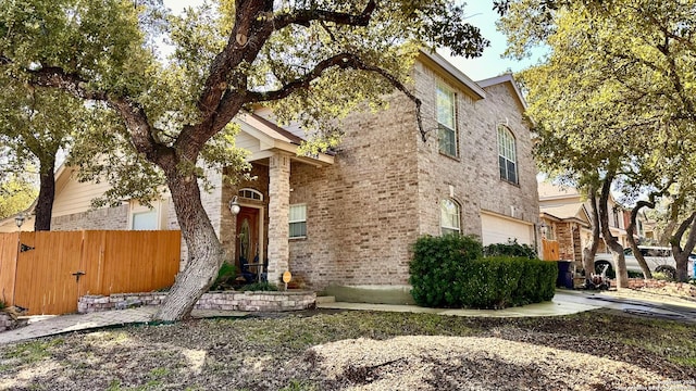 view of side of home with a garage