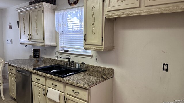 10308 Bobcat Blf, San Antonio, TX 78251 - kitchen with stainless steel dishwasher and dark stone counters