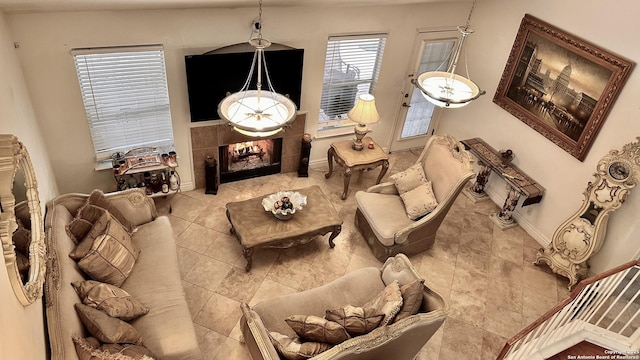 living room featuring tile patterned flooring and a fireplace