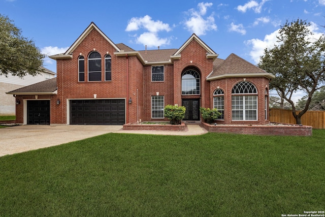 front of property featuring a garage and a front yard