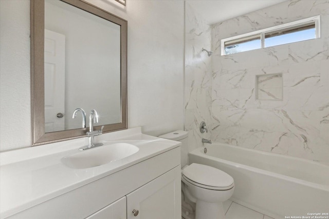 full bathroom featuring vanity, tiled shower / bath combo, and toilet