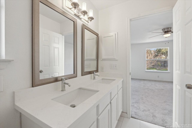 bathroom featuring vanity, tile patterned floors, and ceiling fan