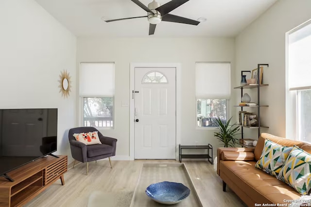 entryway with ceiling fan and light wood-type flooring