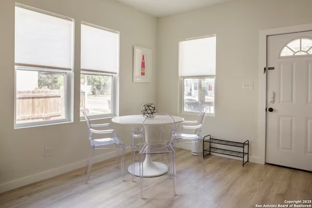 dining area with light wood-type flooring