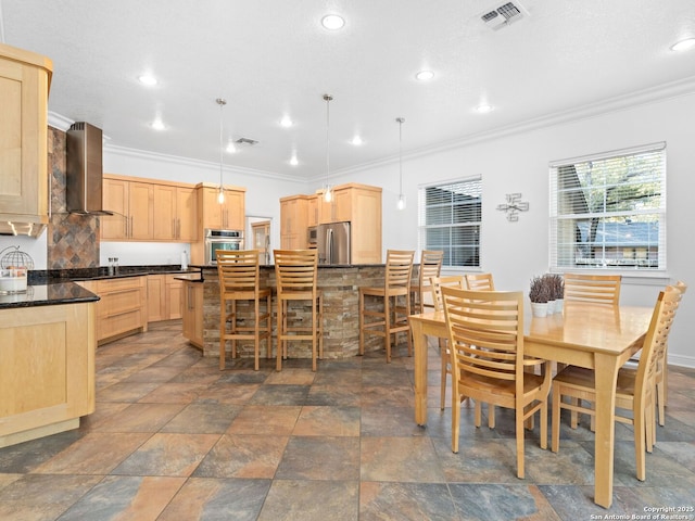 dining room with crown molding