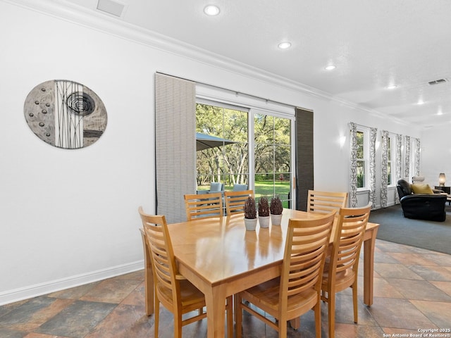 dining room with ornamental molding