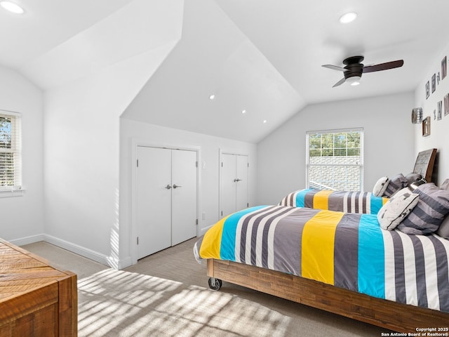 bedroom with lofted ceiling and ceiling fan