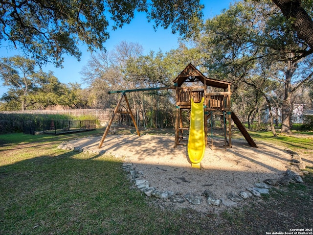 view of jungle gym featuring a yard