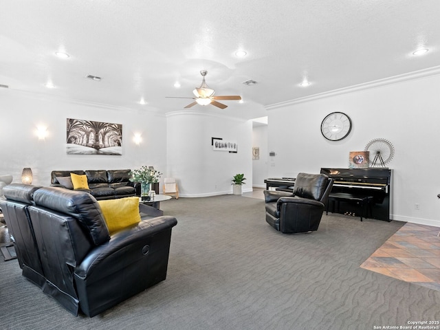 living room with crown molding, carpet floors, and ceiling fan