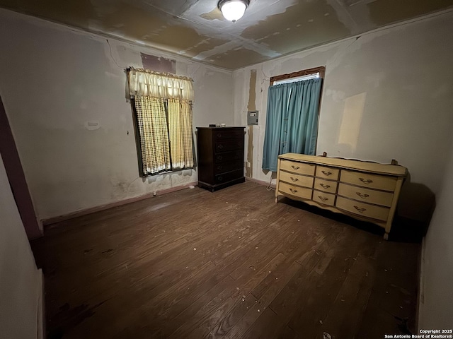 bedroom featuring dark hardwood / wood-style flooring