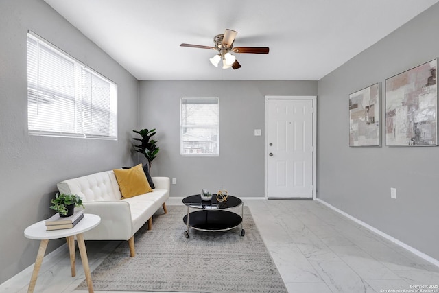 living room with ceiling fan