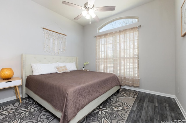 bedroom featuring ceiling fan and dark hardwood / wood-style flooring