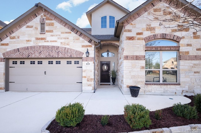 view of front of property with a garage