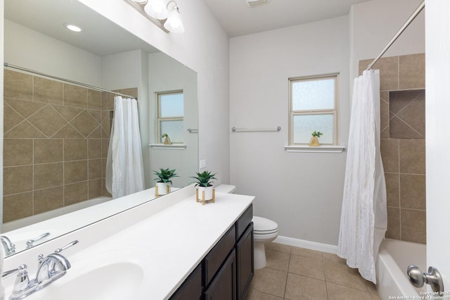 full bathroom with vanity, shower / bathtub combination with curtain, tile patterned floors, and toilet