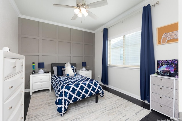 bedroom with ornamental molding and wood-type flooring