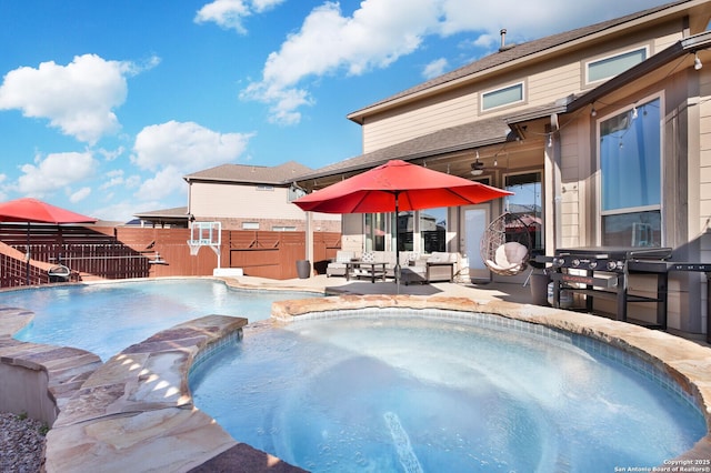 view of pool with an outdoor living space, grilling area, and an in ground hot tub