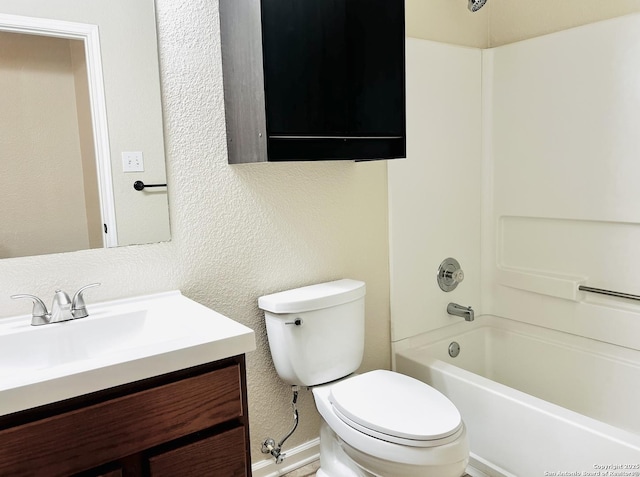 full bathroom featuring toilet, vanity, and shower / tub combination