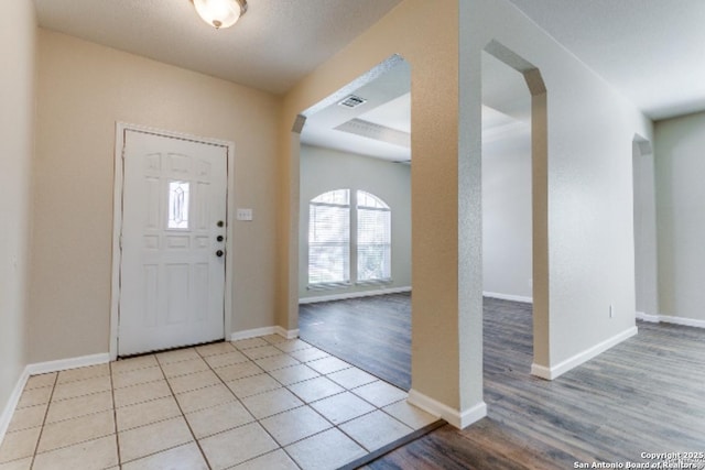 entrance foyer featuring light wood-type flooring