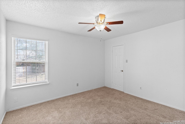 25002 Silverstone, San Antonio, TX 78258 - carpeted empty room with a ceiling fan and a textured ceiling