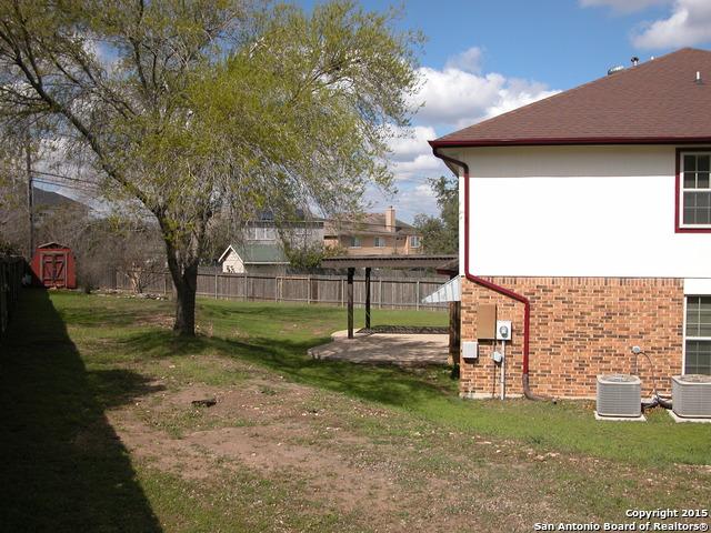 25002 Silverstone, San Antonio, TX 78258 - view of yard with a storage shed and a patio