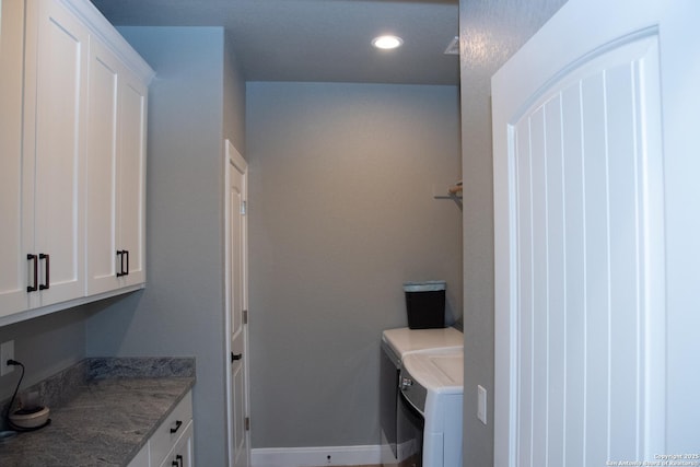 bathroom featuring separate washer and dryer