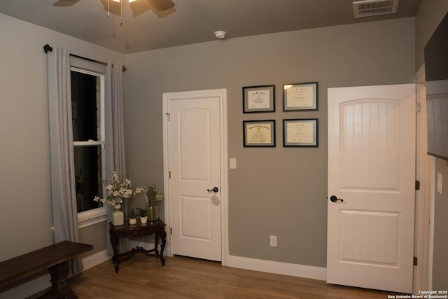 interior space with hardwood / wood-style flooring