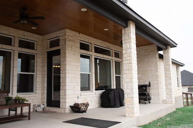 view of patio with grilling area and ceiling fan